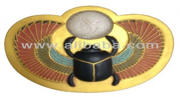 A winged scarab pushing the sun disc