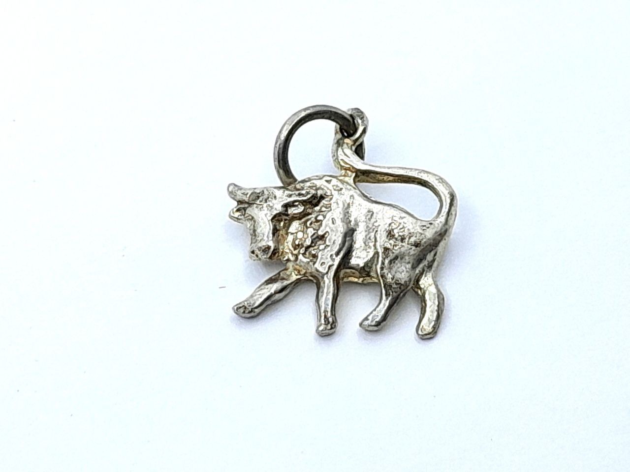 Silver pendant in the shape of a bull