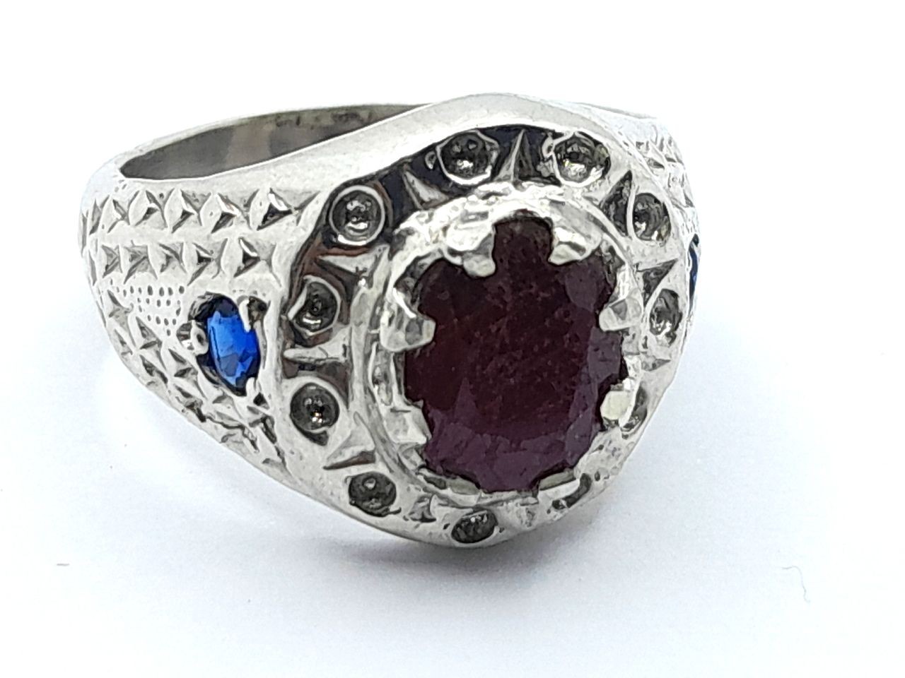 Silver ring with a ruby stone