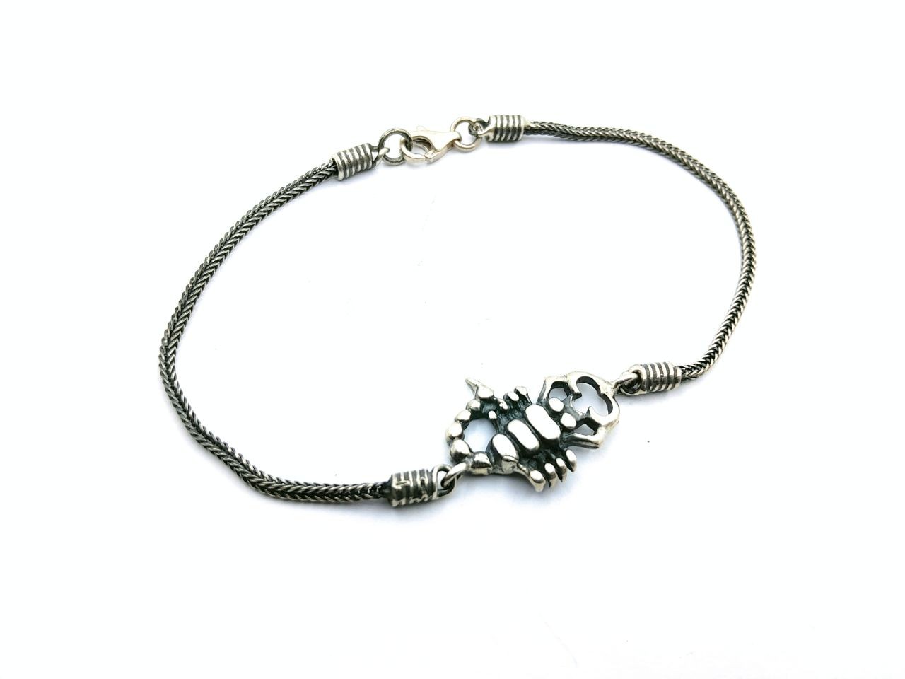 Silver bracelet in the shape of a scorpion
