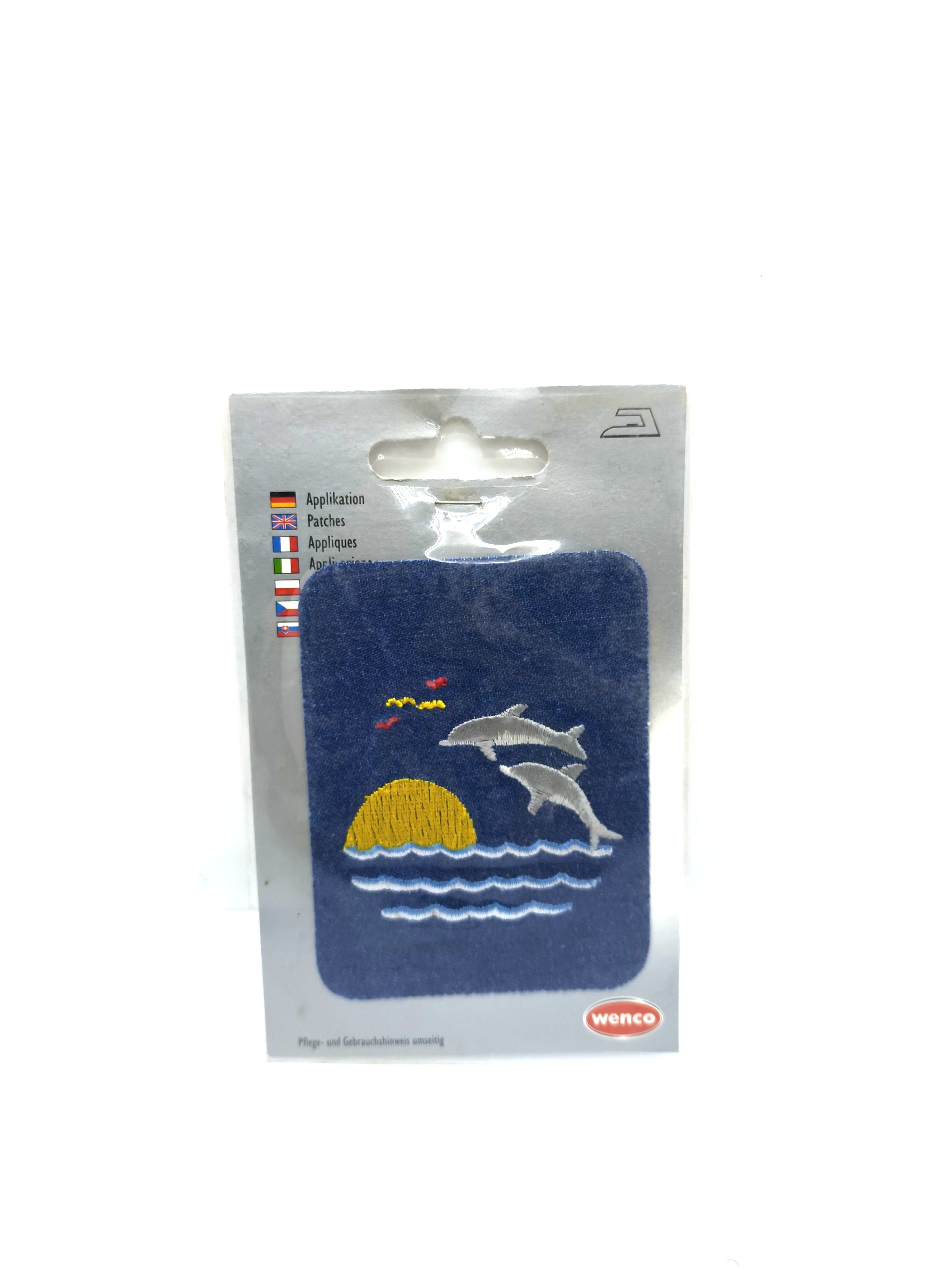 Dolphin and sunset badge By WENCO