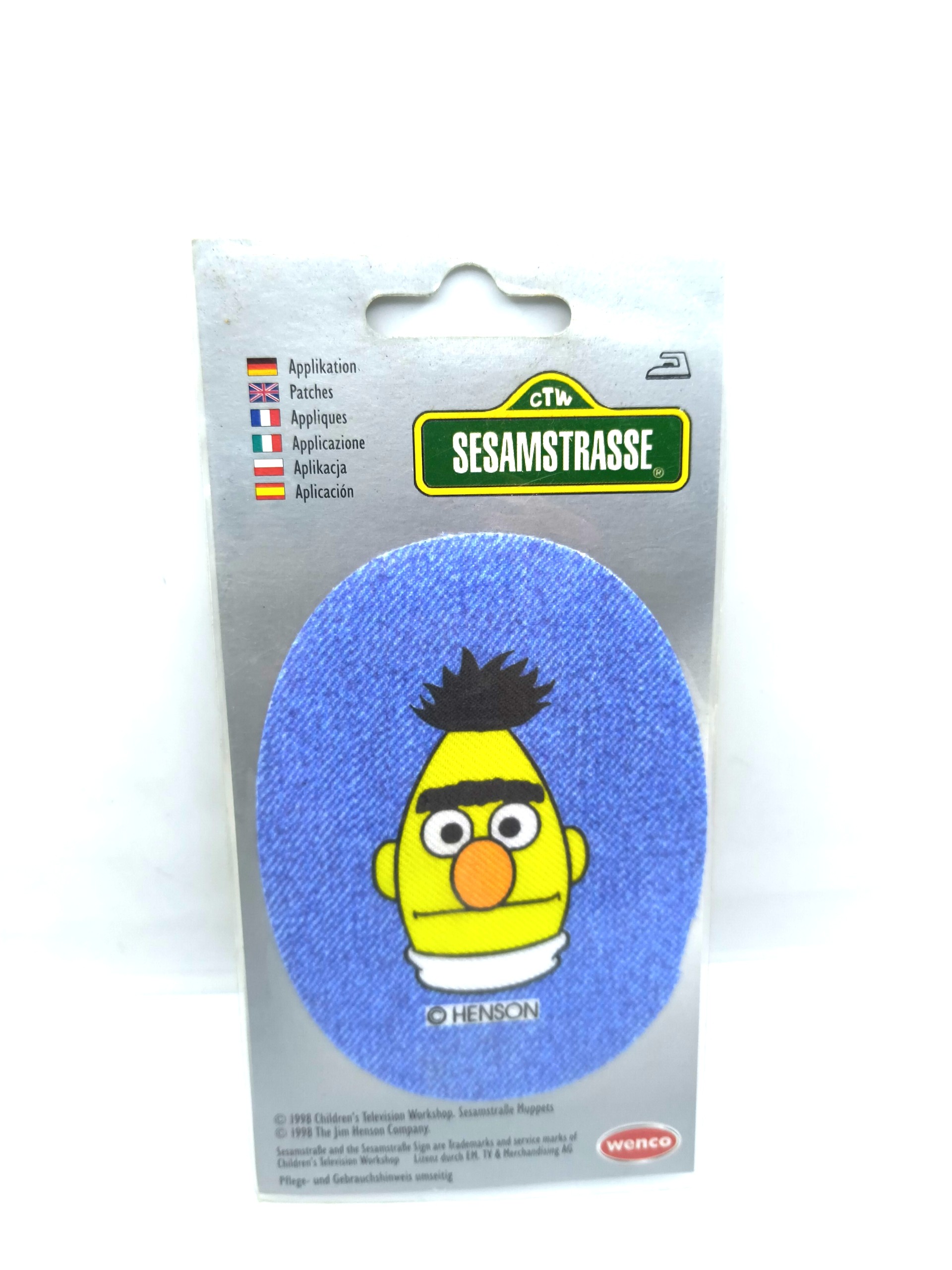 A badge featuring the cartoon character "Peter"