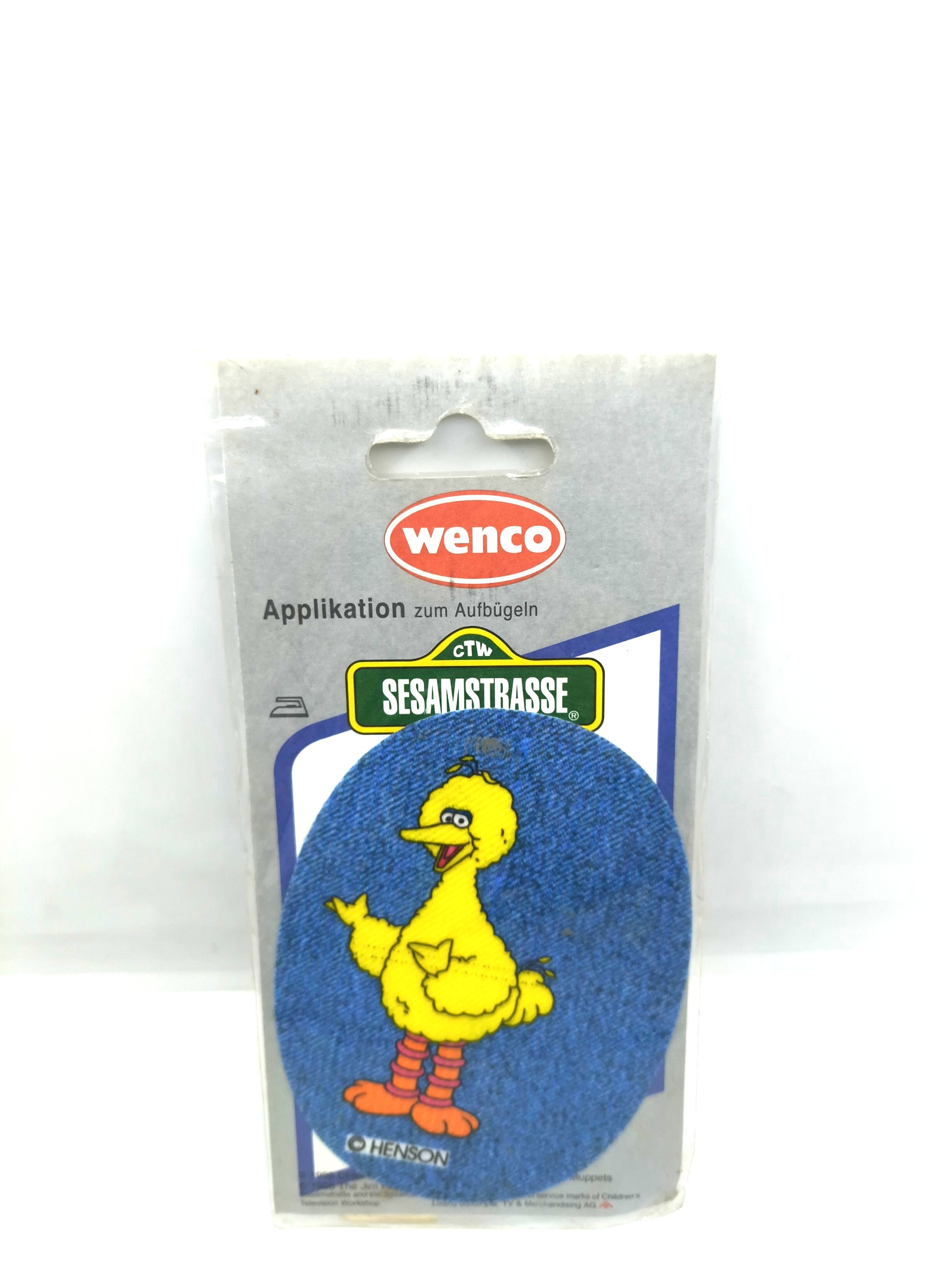 Badge featuring a character from the "Sesame Street" cartoon show