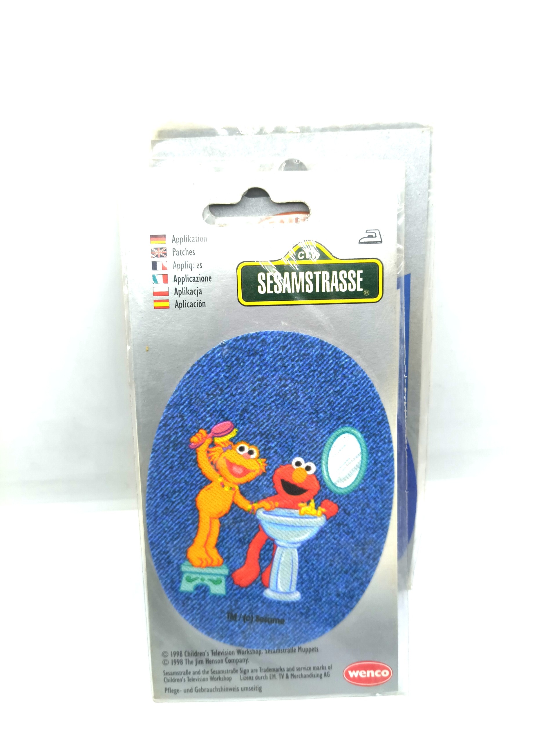 A badge featuring the characters "Elmo and Zoe"